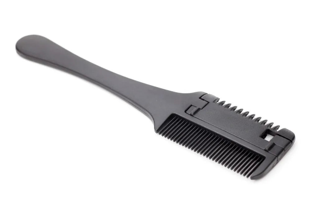 Razor comb for dogs and cats with attached blade and packet of ten spare replacement blades.