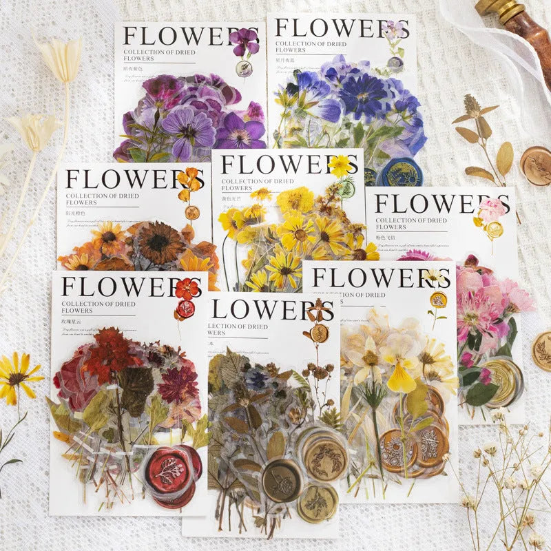 Pack of 40 decorative dried flower design sticker sheets in eight colours including purple, blue, and orange.