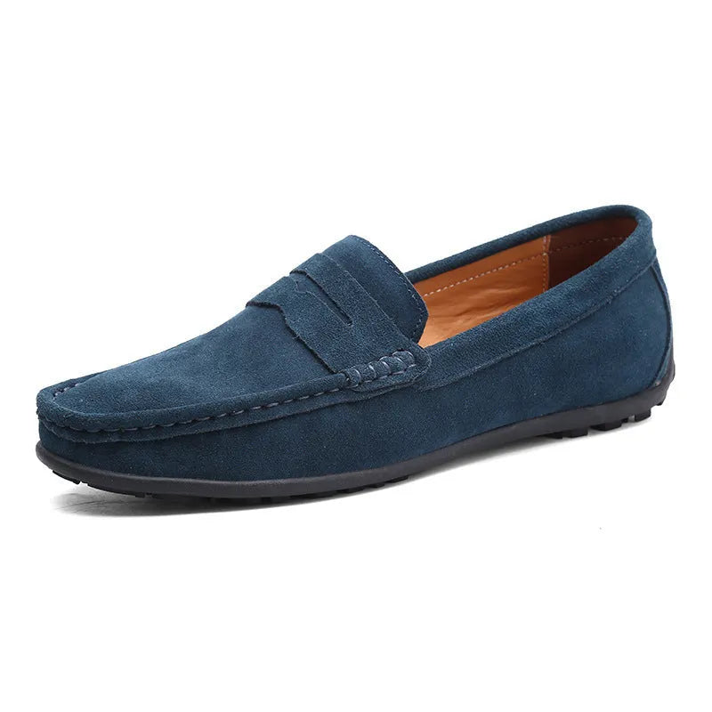 Men's brown suede casual loafers with flat rubber sole and round toe on a white background