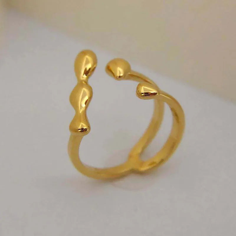 Adjustable open ring for women in brass with circular sphere design, gold or silver finish