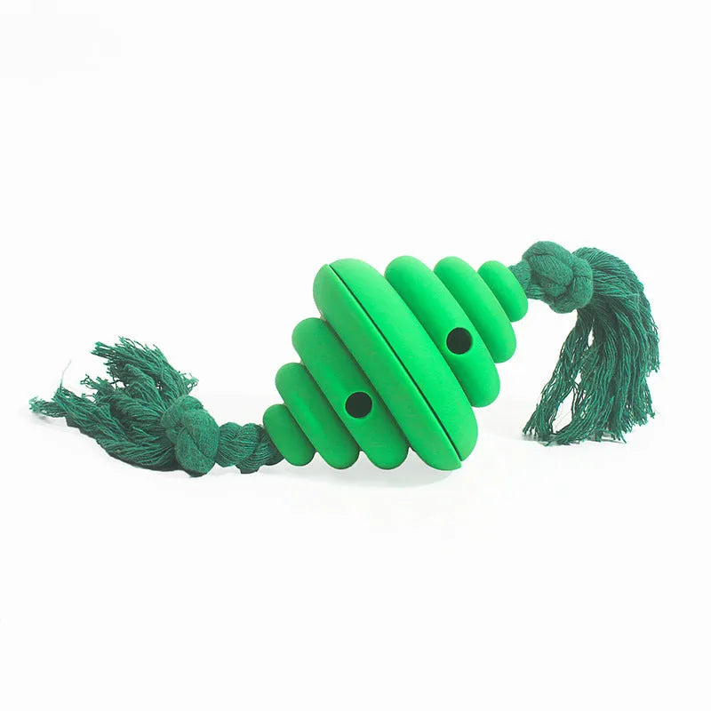 Green and yellow silicone dog ball with rope, showing split spiral design for treat dispensing