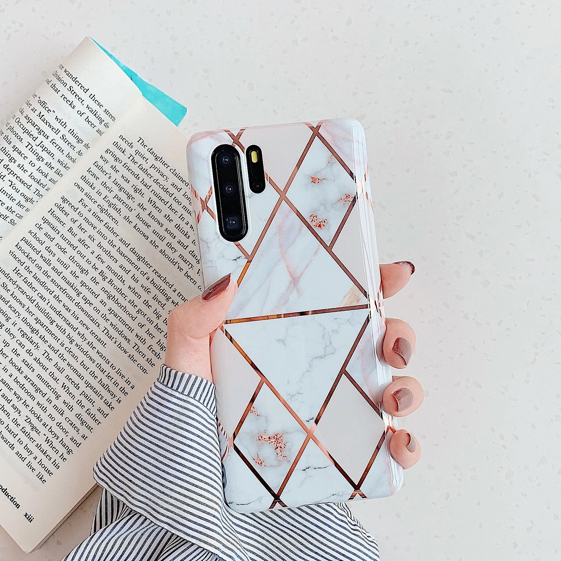 Electroplated marble finish TPU back cover case for Huawei and Samsung smartphones in multiple colours.