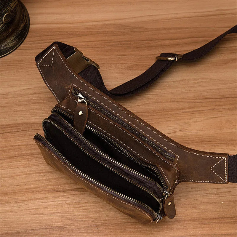 Brown top-layer cowhide leather men's sports waist bag with a pull closure.
