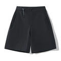 Men's solid colour quick-dry sports shorts with elastic sides on a neutral background.