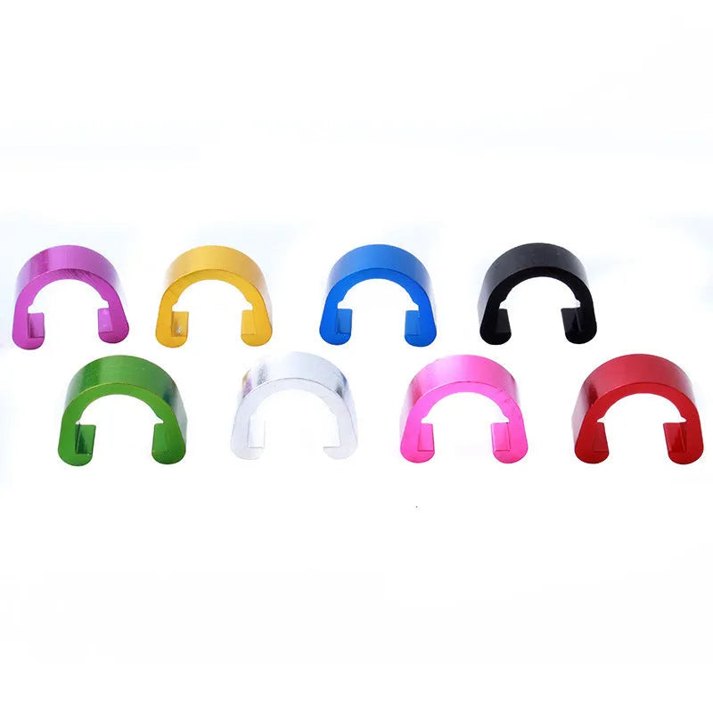 Set of aluminium alloy C buckles in various colours on a white background.