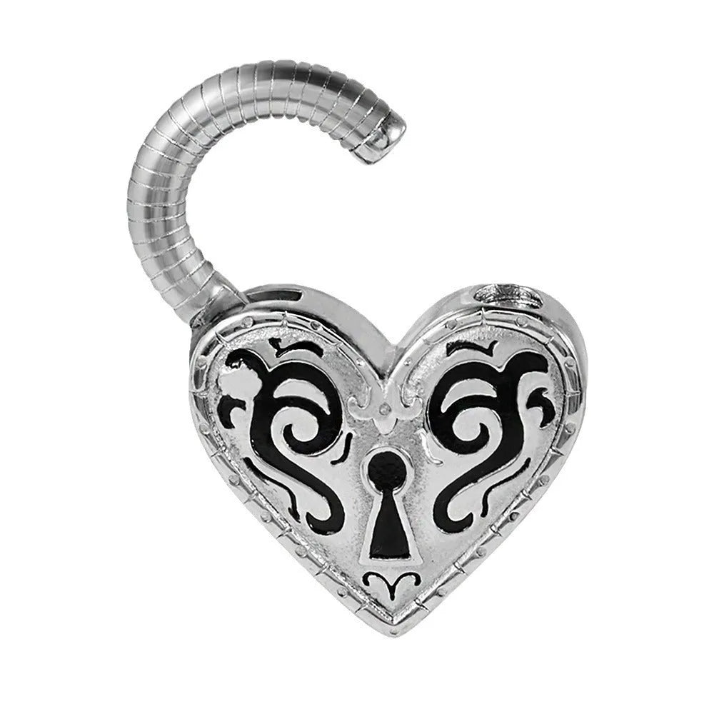 Close-up of a women's stainless steel heart-shaped earring with a gold electroplated finish.