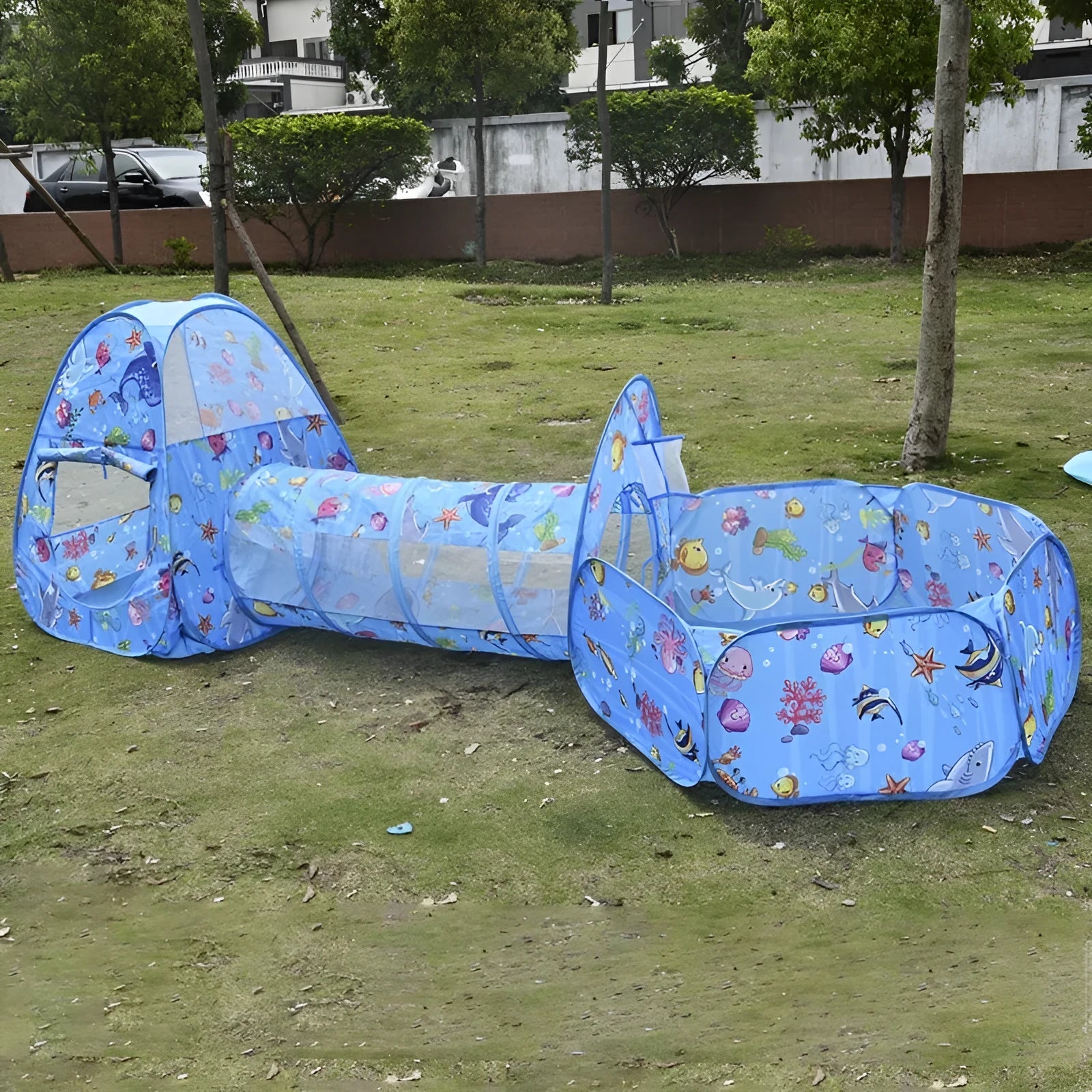 Children's three-in-one play tent with tunnel and ball pool in a cartoon submarine design.
