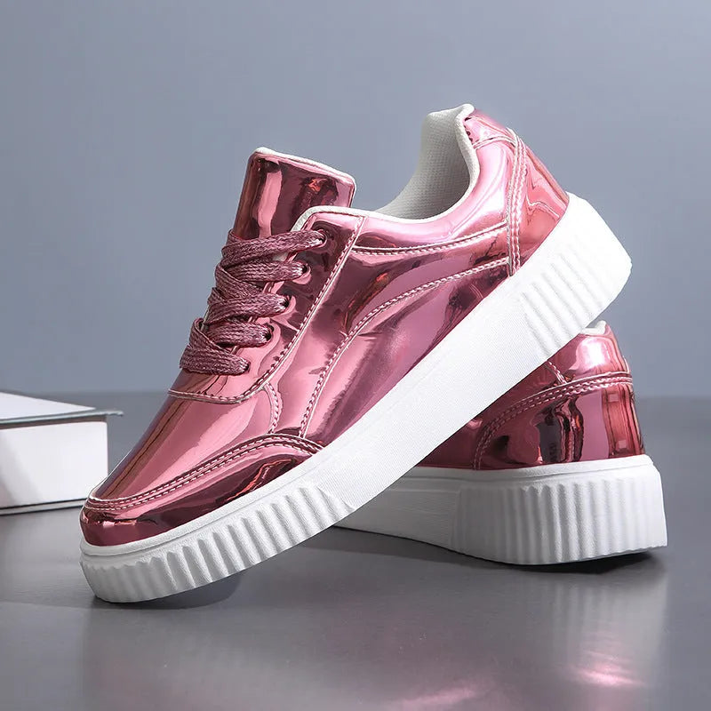 Gold sequinned platform sneakers with a round toe and a thick MD sole.
