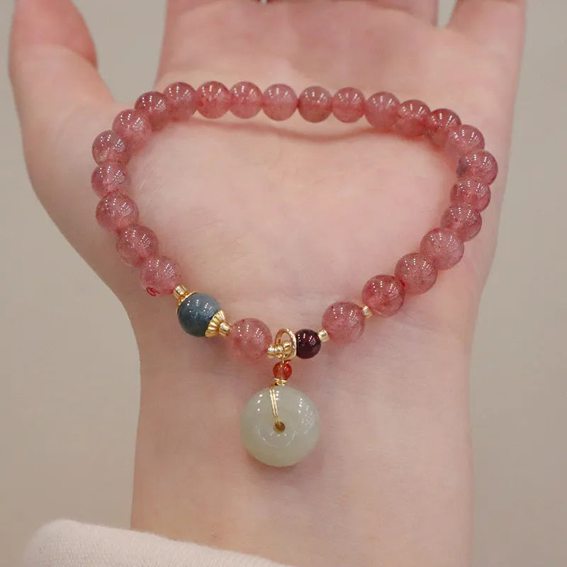 Pink strawberry quartz purse bracelet with geometric shapes and safety buckle closure