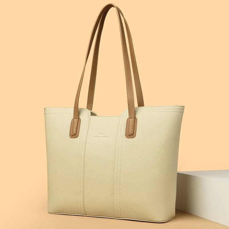 Women's genuine leather shoulder bag in milky white with three-dimensional outer pocket and waterproof finish