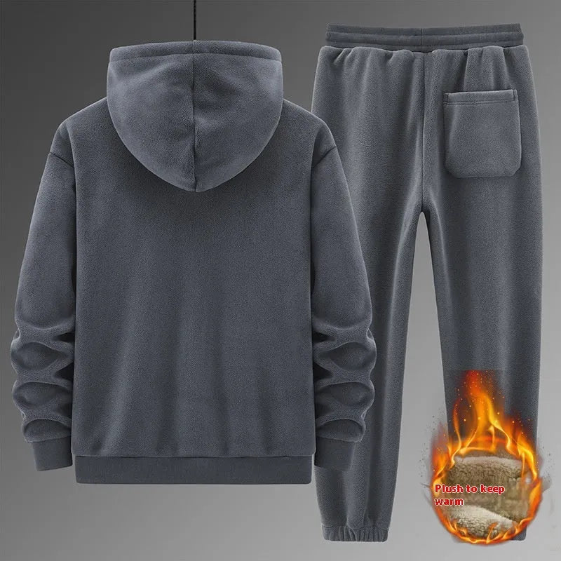 Men's grey cashmere-blend hooded sports sweater and matching trousers laid flat.