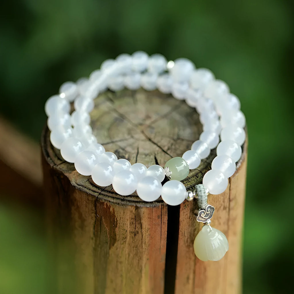 Original design women's bracelet in S925 sterling silver with white agate and Hetian jade geometric lotus pattern