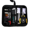 Black plastic toolbox containing a guitar repair and maintenance tool kit for guitar, bass, mandolin, and banjo.