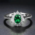 Women's electroplated copper ring with flower shape and zirconium stone accents in blue moissanite colour