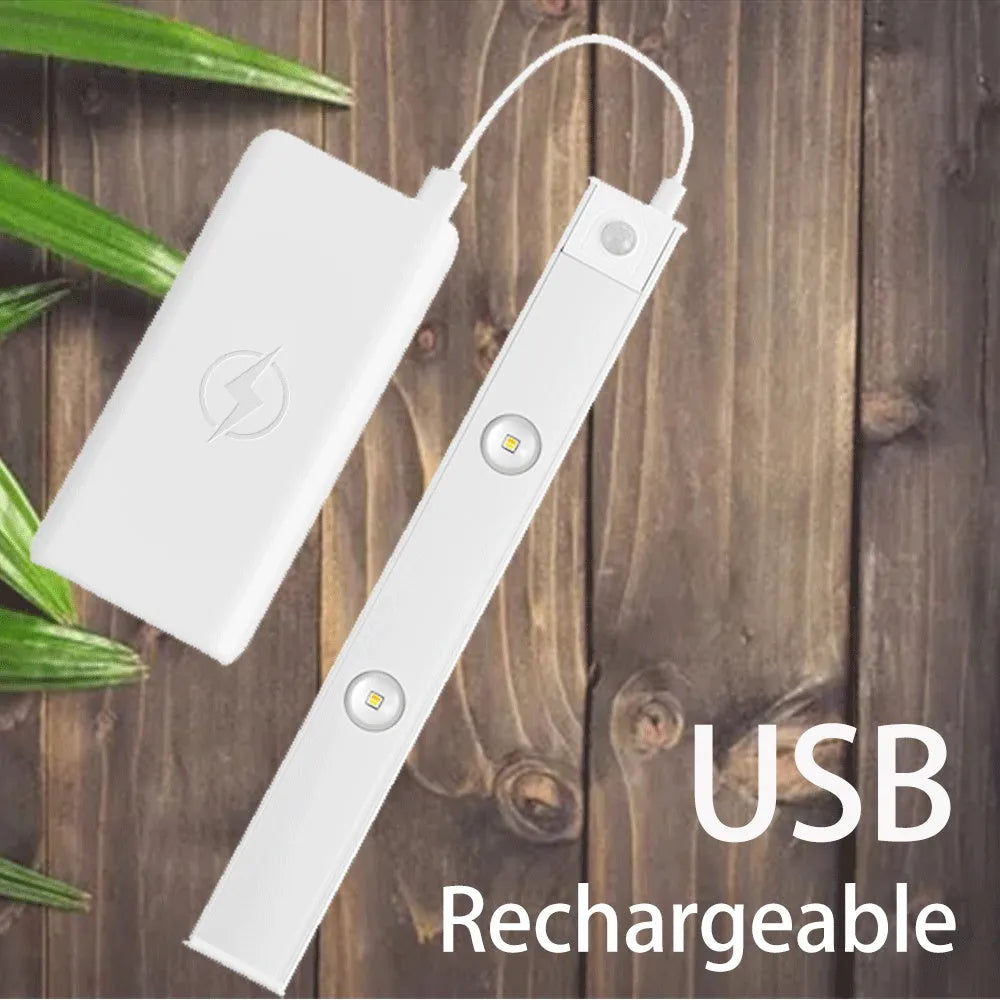 Thin silver aluminium USB rechargeable LED light strip with motion sensor for cabinet mounting
