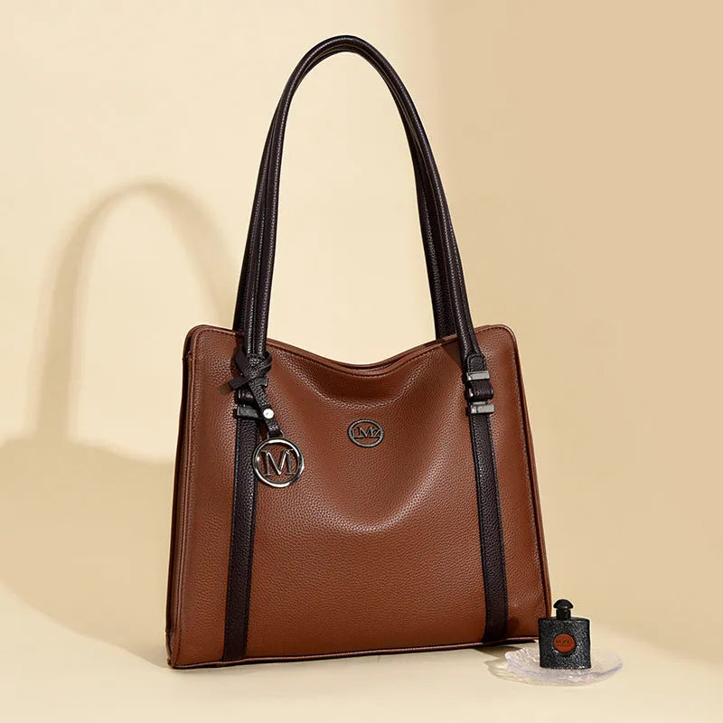Women's soft black PU leather retro crossbody bag showing double straps and horizontal square shape.