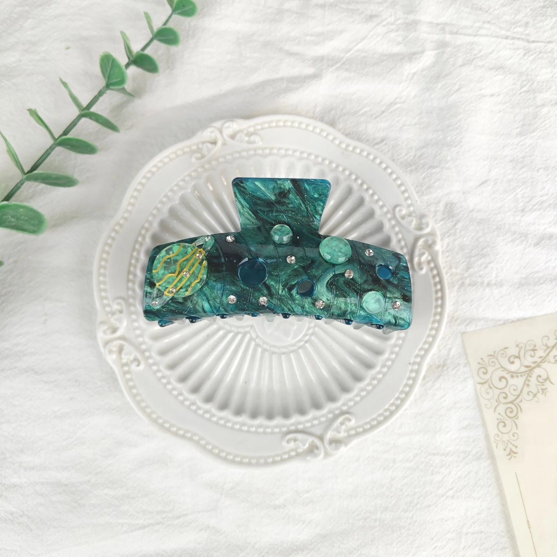 Oversized women's hair barrette with a starry sky pattern in sky blue.