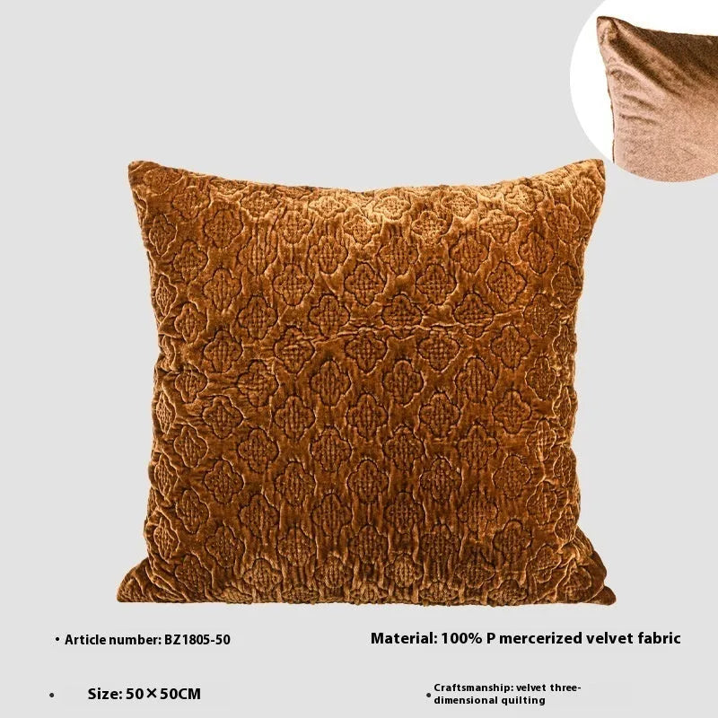 Brown gold antique Chinese style quilted cushion pillow on a sofa