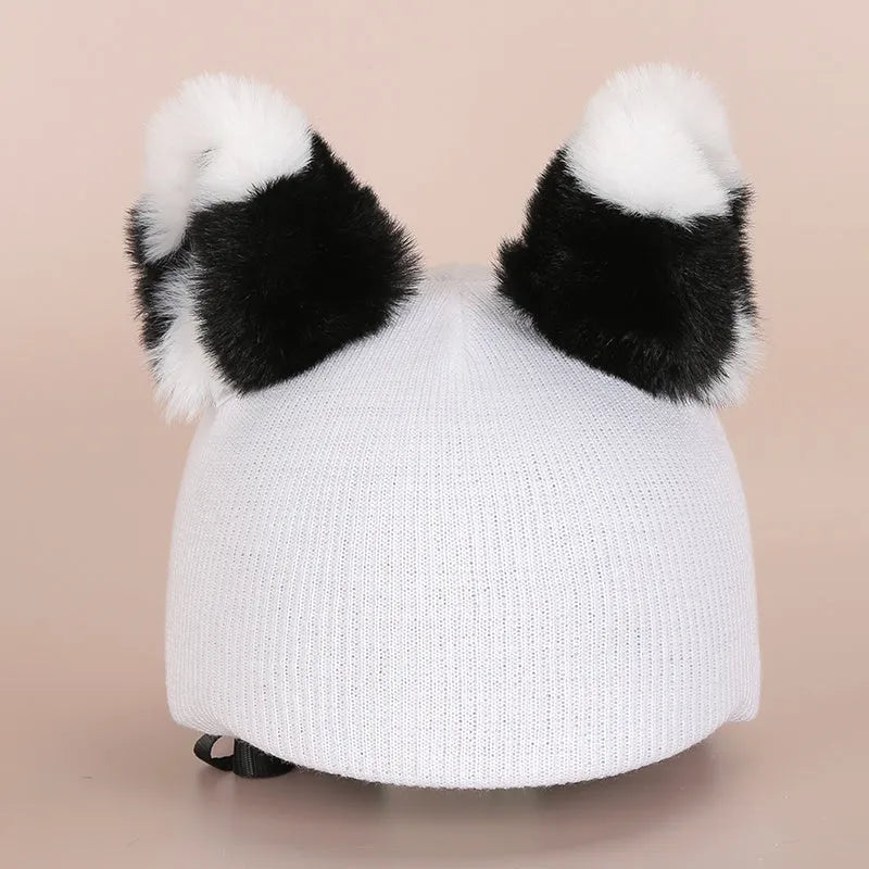 A soft plush ski helmet decoration cover featuring a cute cartoon character design.