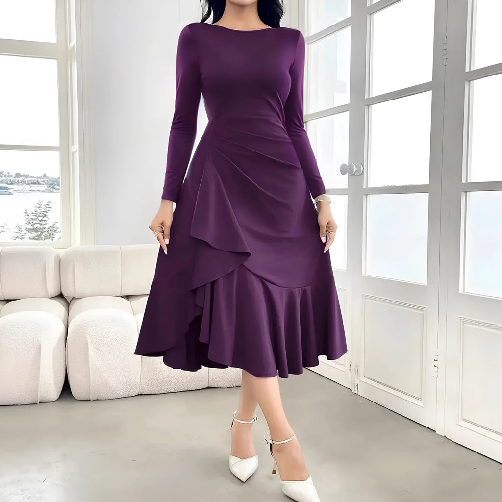Purple women's long sleeve dress with round neck, mid waist, and ruffle trim.