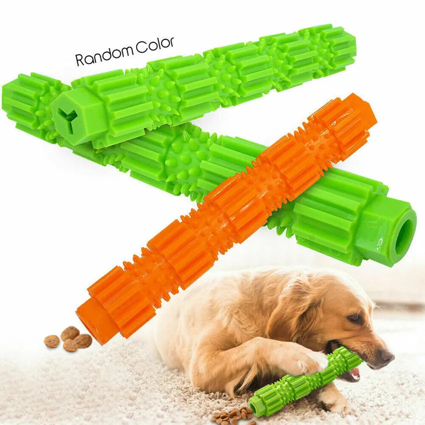 Green natural rubber dog chew toy with treat holes and squeaker for aggressive chewers