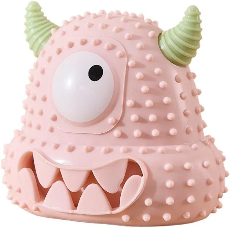 Little monster vocal dog toy in blue with exaggerated eyes, horns, and teeth; made of bite-resistant silicone.
