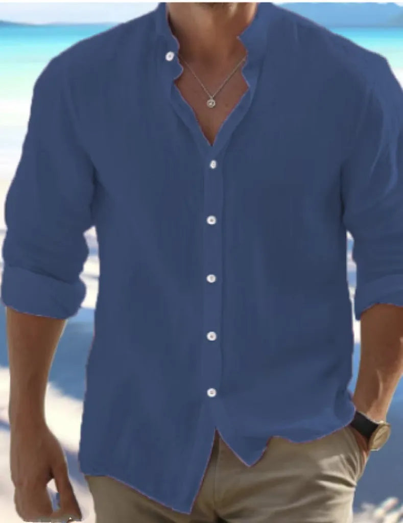 Men's white linen button-up summer beach shirt with collar on a hanger.
