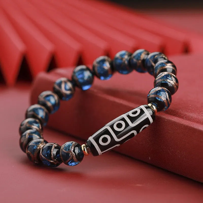 Chinese-style coloured glaze lucky bead bracelet with auspicious patterns for the Year of the Snake.