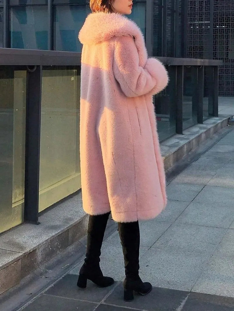 Women's thick grey faux rabbit fur and leather mid-length coat with artificial fur collar.