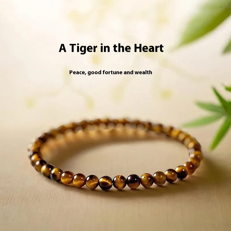 New Chinese style geometric Tigereye bracelet with round elements in three bead sizes