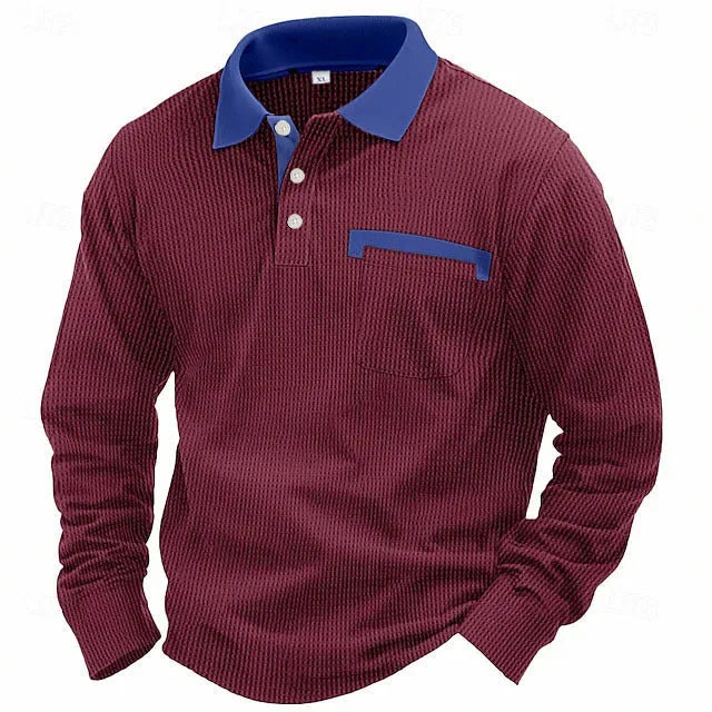 Man wearing a long-sleeved waffle-texture polo shirt in a solid colour with a loose, retro fit.