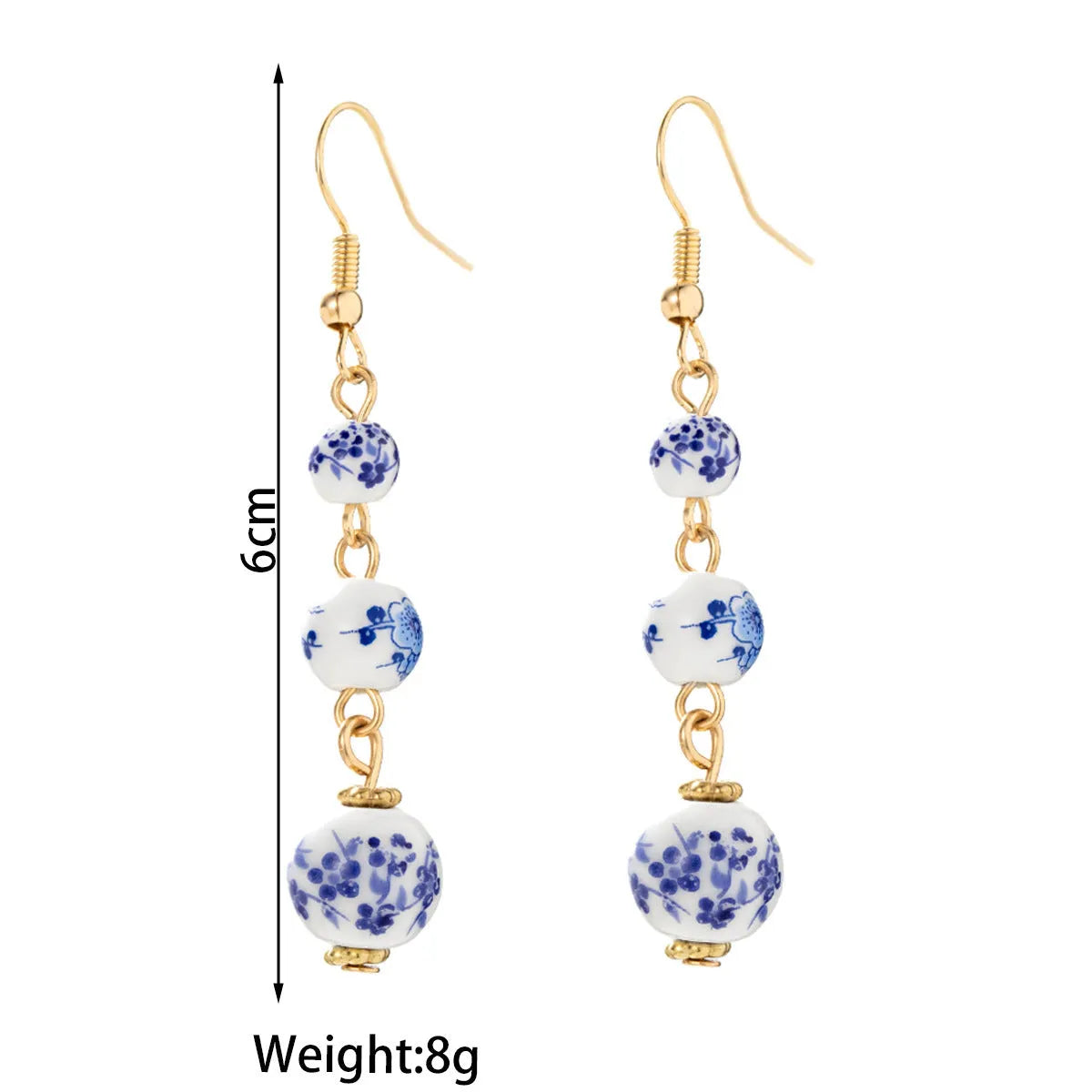 Blue and white porcelain ceramic bead long drop earrings with geometric alloy design