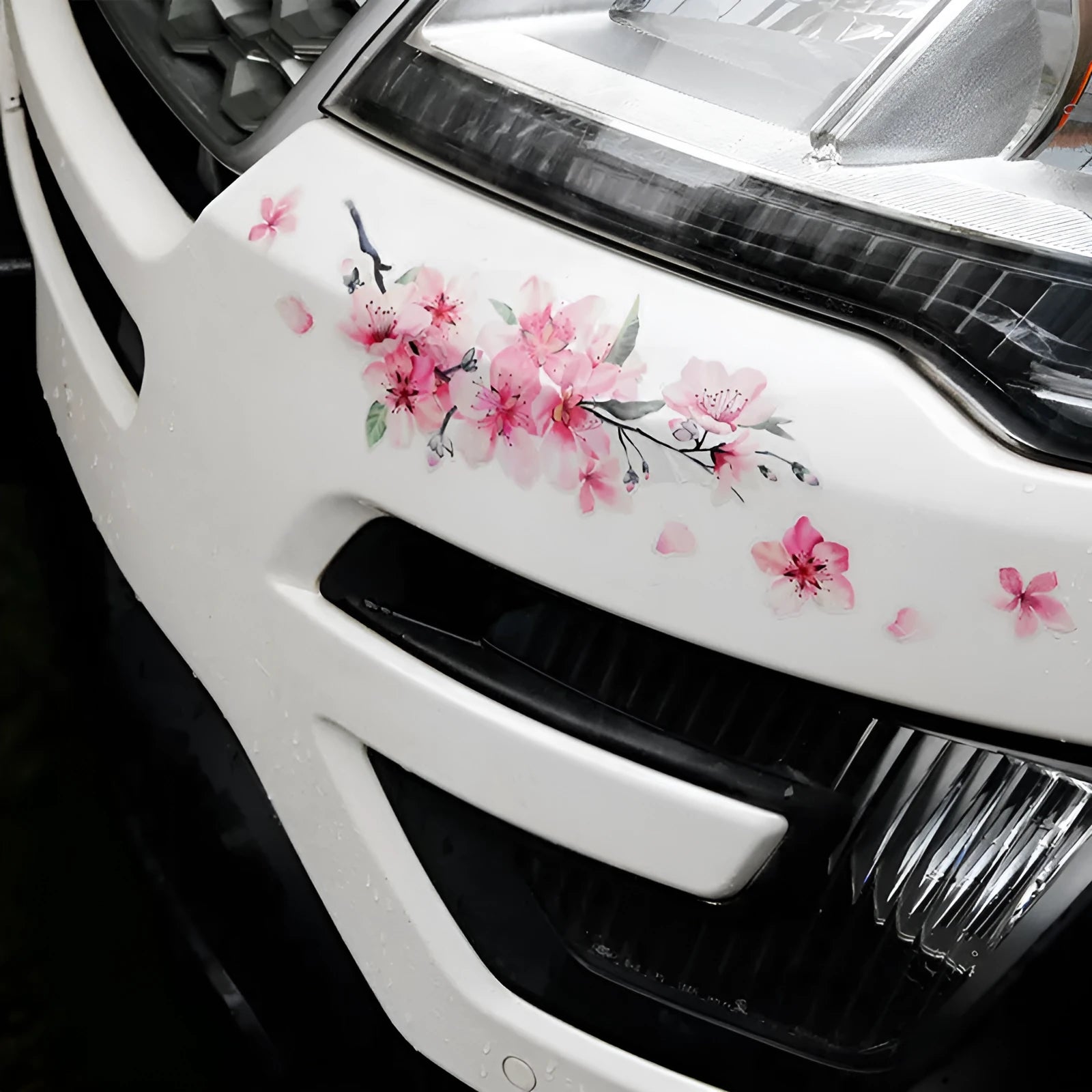 Cherry blossom flower pattern car sticker in two size options on a vehicle window.