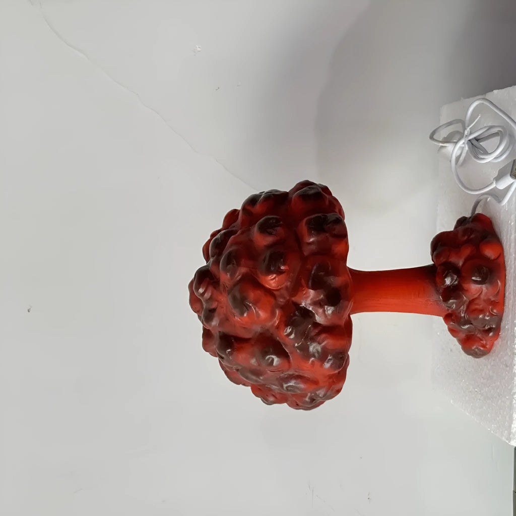 Atomic Bomb mushroom cloud shaped USB table lamp with modern art decorative design on a table.