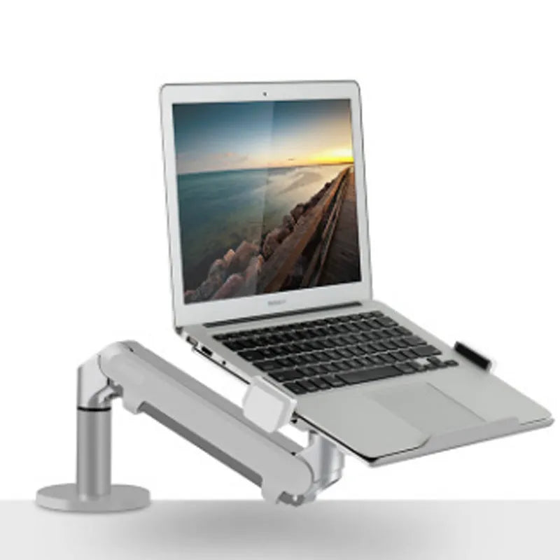 Silver aluminium laptop stand with adjustable air pressure arm on wooden desk