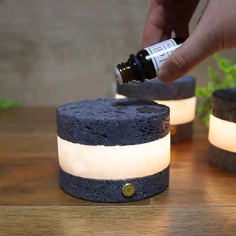 Compact orange volcanic rock USB night lamp with dimmer and essential oil tray.