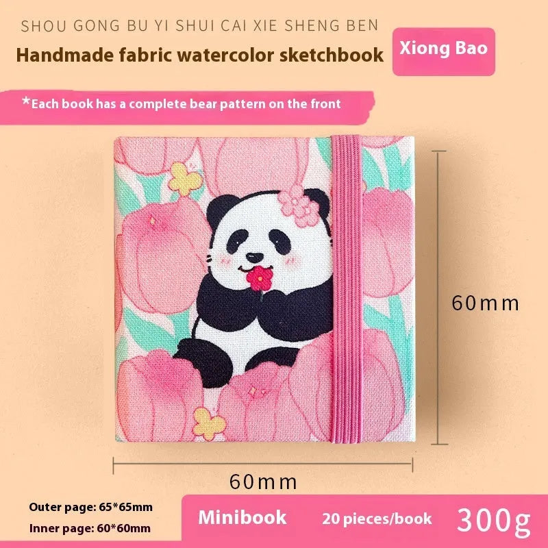 Feiluniao handmade fabric watercolour notebook in 185mm portable size, showing artistic cover design.
