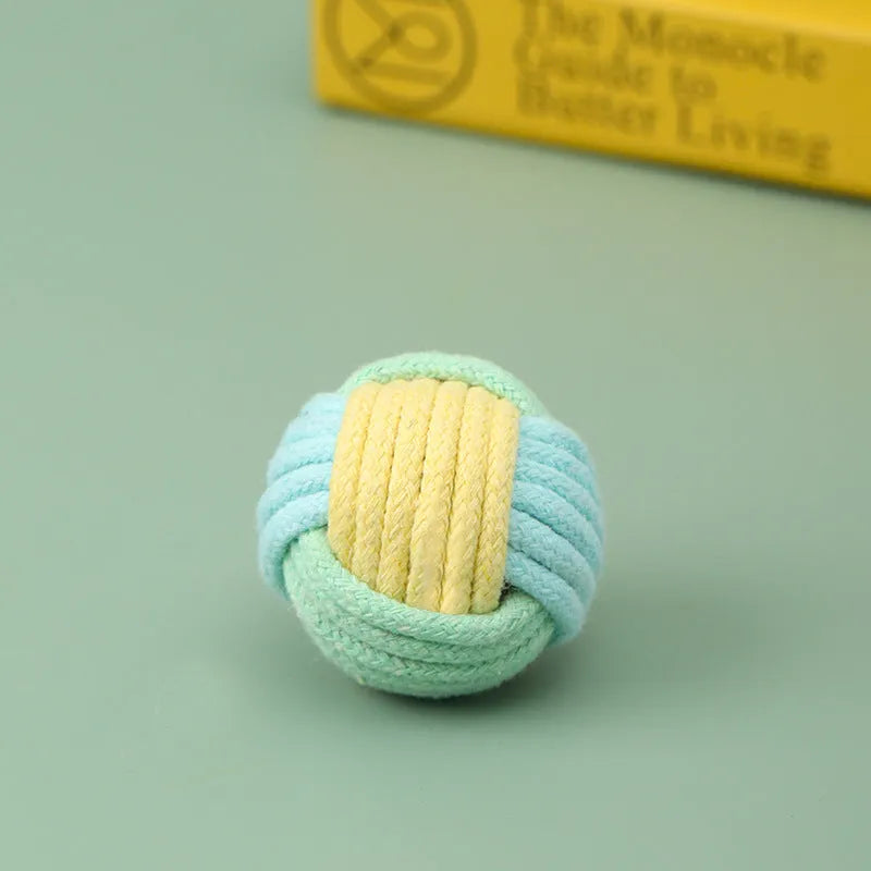 Handmade cotton cat hairball plush toy in blue-pink, green-blue, or pink-green colours, 5cm in diameter.