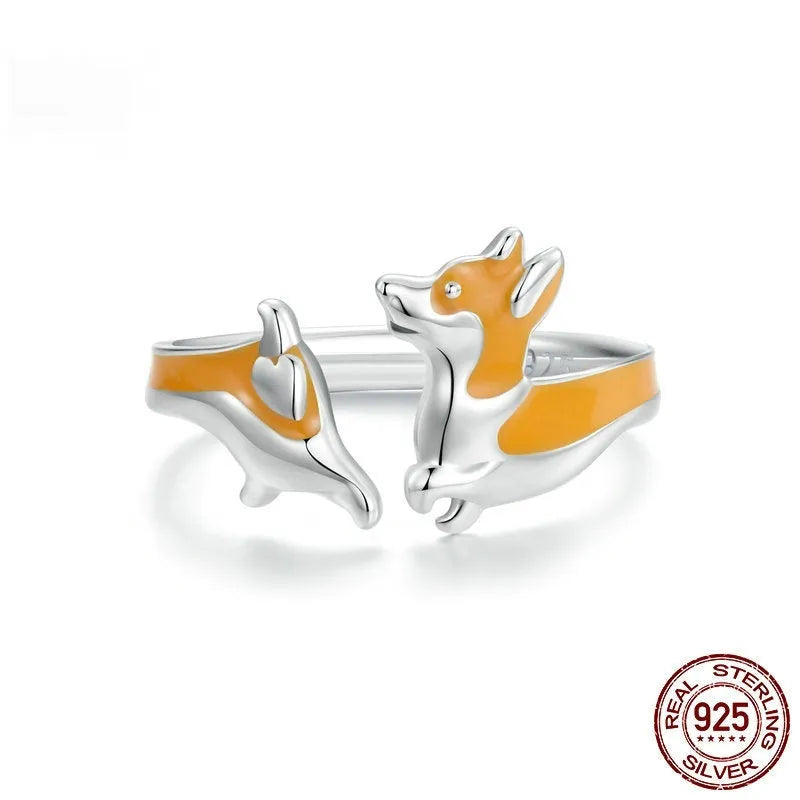 Silver electroplated fashion ring with a cartoon Corgi dog design, colour SCR1014-E.