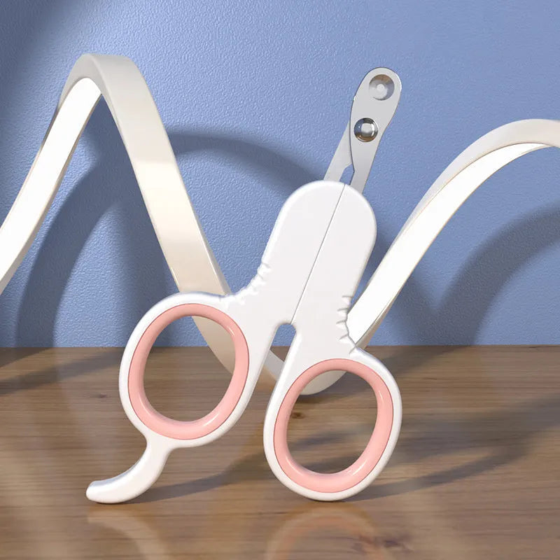 Professional pet nail clippers with curved stainless steel blades and ergonomic rubber handle for grooming cats and small dogs