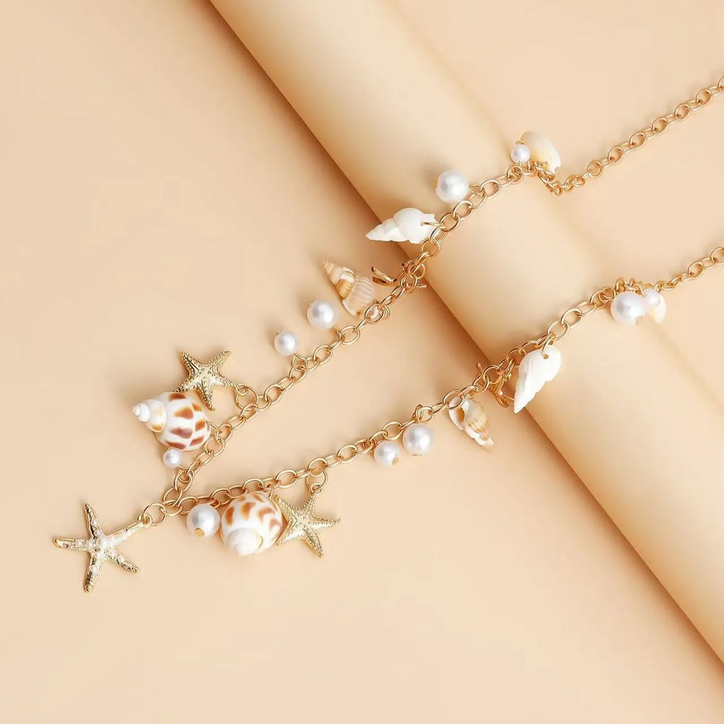 Women's summer beach waist chain and matching bracelet set with star charms in alloy metal