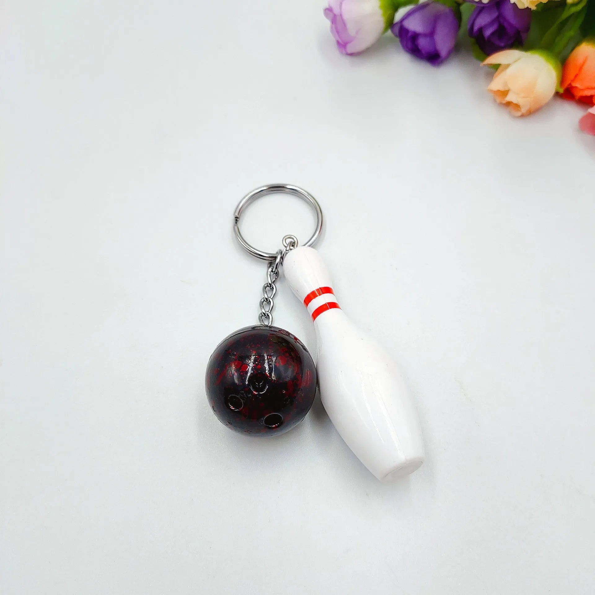 Mini bowling simulation keychain pendant in PVC metal available in four colours