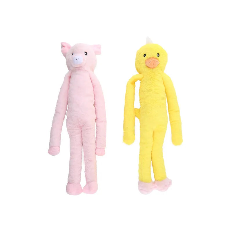 Large pink and yellow plush dog toy with squeaker and crinkle sounds for golden retrievers
