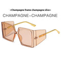 A pair of large square frame sunglasses on a white background, showing the oversized silhouette.