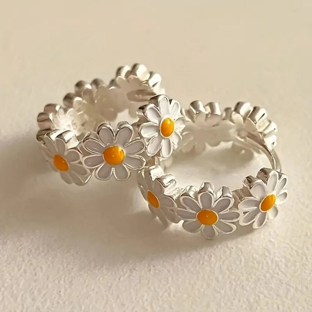 White daisy flower ring earrings with electroplated finish and platinum gem accents on copper