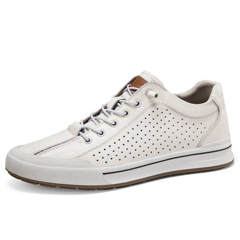 Men's white round toe matte leather casual shoes with flat heel on a plain background.