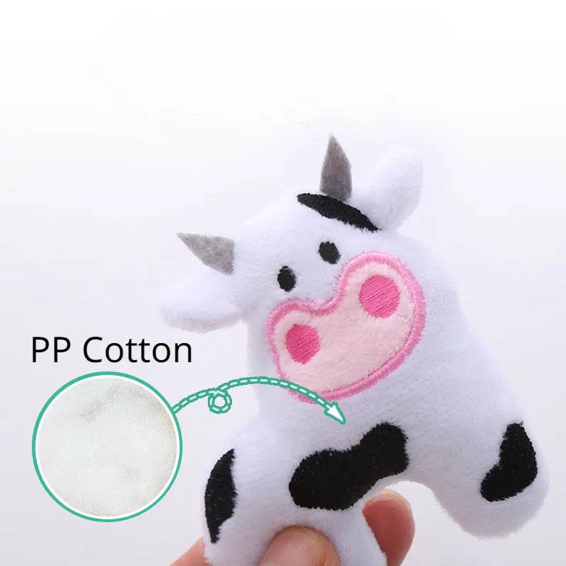 Soft plush cat toy shaped like a cow, a parrot, and a crocodile, each containing catnip for pet play.