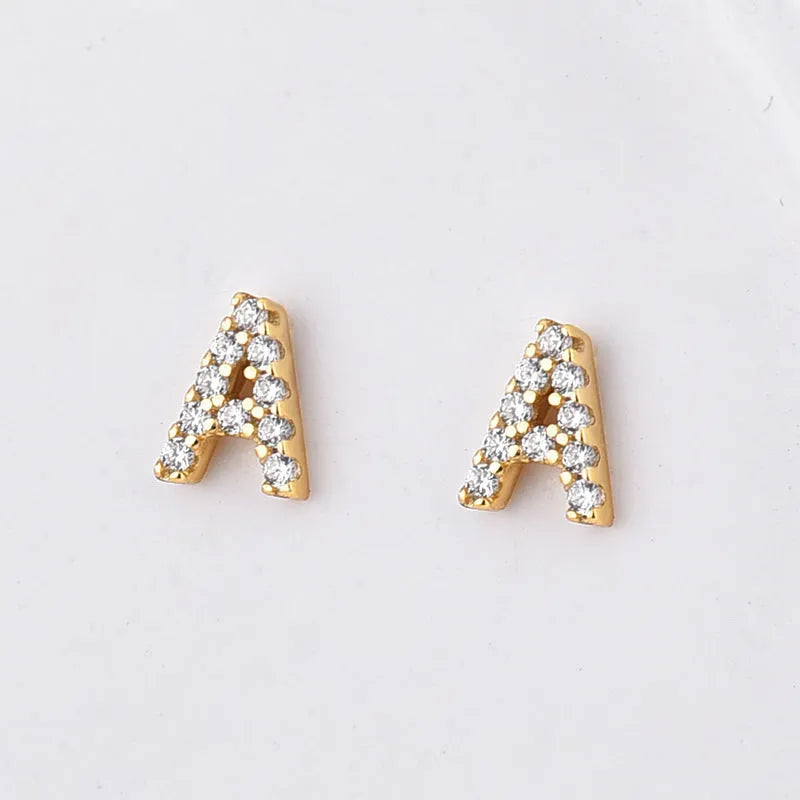 Brass gold plated alphabet letter earrings showing zircon detailing on copper base with 26 English letters available