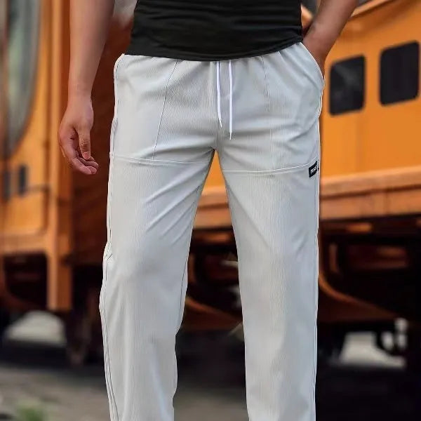 Men's casual polyester trousers for spring and autumn in various colours including light gray and black