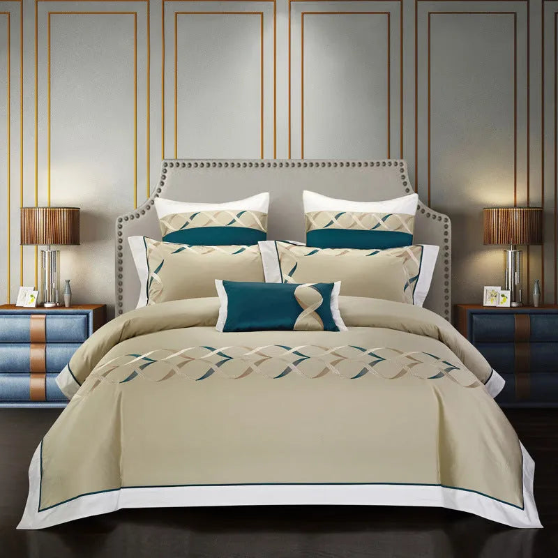 Cotton embroidery bedding set showing satin weave texture and embroidery pattern detail